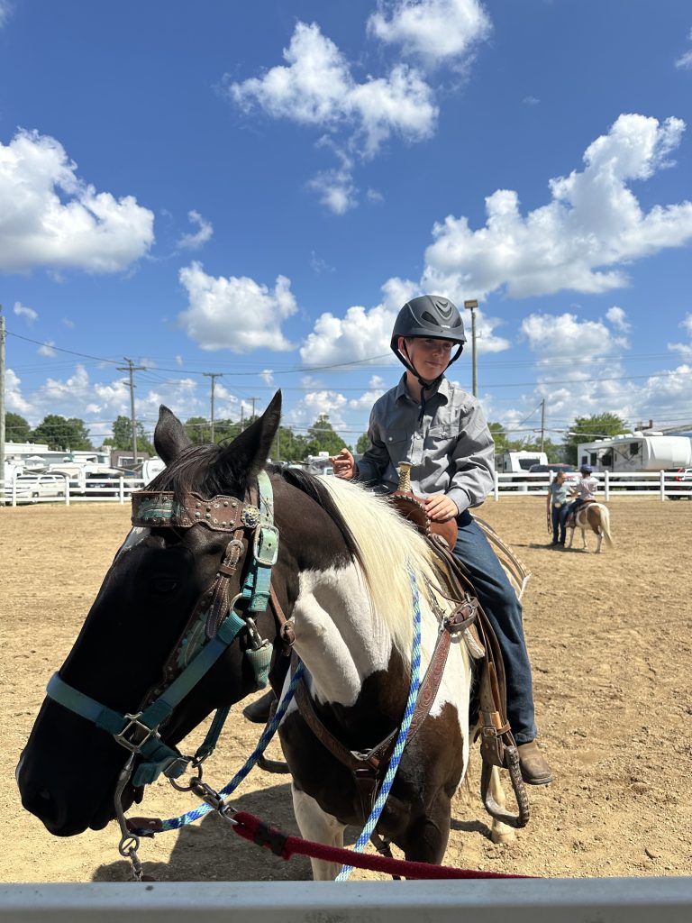 C (our oldest son) on a Horse